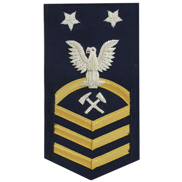 Coast Guard E9 Rating Badge:  Damage Controlman "DC" - blue