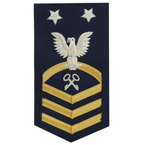 Coast Guard E9 Rating Badge:  Storekeeper "SK" - blue